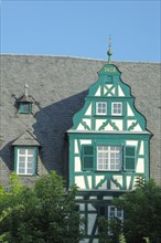 Tail gable with year of the half-timbered house Hotel and Restaurant Schwan built 1628 in Oestrich