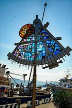 Oversized modern sculpture of nautical sextant