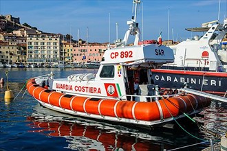 SAR Search and Rescue speedboat of the Italian Coast Guard Guardia Costiera in the harbour of Portoferraio moored at the quay