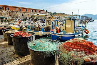 Tubs with red and green fishing nets