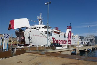 Car ferry with open hatch entry at Portoferraio ferry terminal
