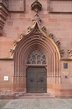 Portal with tympanum of the neo-Gothic Melanchthon House in Bretten