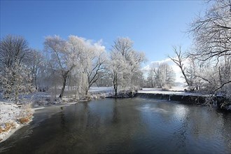 Winter landscape on the Jagst with hoarfrost and snow