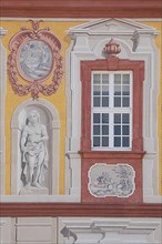 Mock painting Trompe-l'oil on the facade of the baroque castle