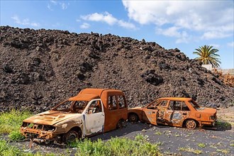 Burnt cars at the lava flow
