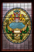 Leaded glass in the town hall shows the coat of arms of Hamburg and insignia of the former Hanseatic League