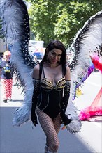Transvestite with wings at the CSD parade