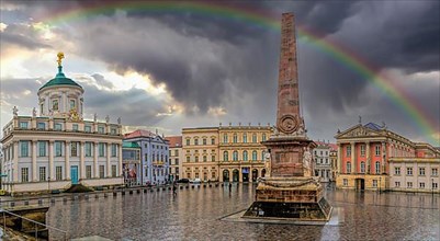 Panorama at the old market with storm clouds and rainbow Potsdam