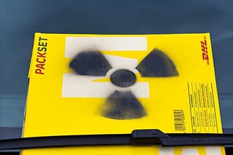 Sign for radioactivity on yellow package