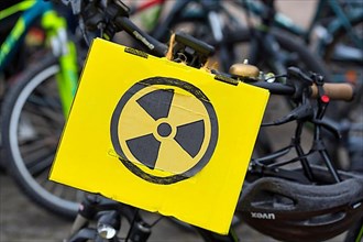 Sign for radioactivity on a yellow cardboard box