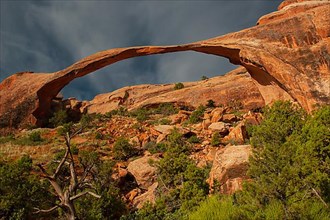 Landscape Arch at sunrise and approaching thunderstorm