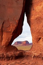 View through the Tear Drop Arch to the Mesas in Monument Valley