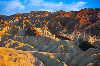 Coloured rock formations in the evening light at Zabriskie Point