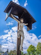 Crucifix in the cemetery of the Catholic parish church of St. George