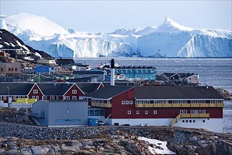 Icefjord and houses in the town of Ilulissat