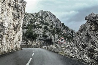 Winding road through rocky landscape