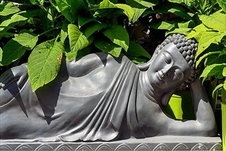 Reclining Buddha figure