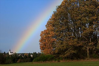 Rainbow over field and woodland near Eschweiler