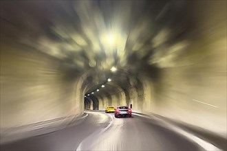 Sports car driving through tunnel from country road in southern France