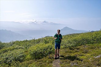 Hikers on trail on Tindfjoell ridge