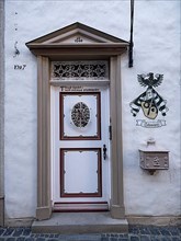 Front door and letterbox on a half-timbered house from 1500 in the old town