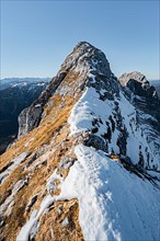 Summit ridge with first snow in autumn