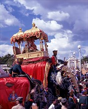 Goddess Chamundeshwari placed in 750 kilograms of golden mantapa on the top of a decorated elephant in Dussera or Dasara procession during Navarathri festival in Mysuru or Mysore