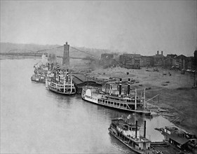 Steamers and boats at a mooring on the Ohio River