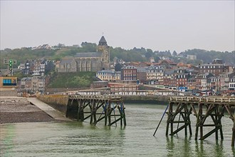 Coastal village of Le Treport at the mouth of the Bresle on the English Channel with Saint-Jacques church