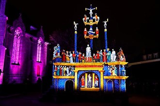 Christmas light projections on the Calvary of Plougastel-Daoulas next to the church of Saint Pierre