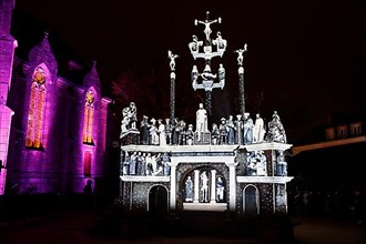 Christmas light projections on the Calvary of Plougastel-Daoulas next to the church of Saint Pierre