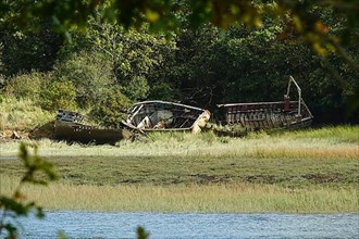 Wrecks of former fishing boats at the Anse du Moulin Neuf inlet