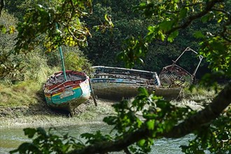 Wrecks of former fishing boats at the Anse du Moulin Neuf inlet