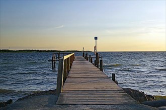 Wooden bathing jetty in the evening light