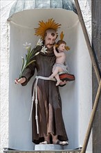 Figure of St. Konrad von Parzheim on the outer wall of St. Konrad Church