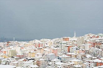 A winter view from the city of Istanbul with houses covered with white snow