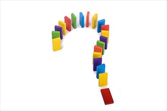 Question mark with colored wooden dominos on a white background