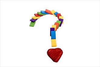 Question mark with colored wooden dominos pieces and a heart