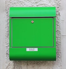 Green mailbox at an office of the Buendnis 90 Die Gruenen party