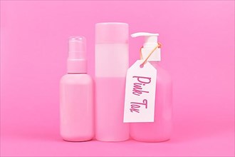 Pink tax concept with various stereotype pink colored hygiene products marketed to women,