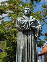 Luther monument by the sculptor Adolf von Donndorf from 1895 on Karlsplatz in Eisenach. The reformer Martin Luther,
