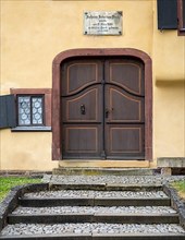 Entrance door and sign at the Bach House, birthplace of Johann Sebastian Bach. The musician and composer was born here on 21. 03. 1685