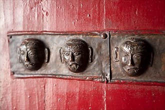 Metal ornaments on a monastery door, Diskit Monastery or Deskit Gompa