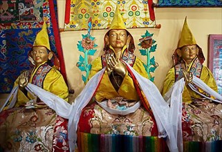 Holy statues holding prayer shawls, prayer hall
