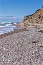 Shingle beach, steep coast