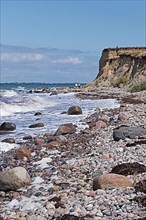 Shingle beach, steep coast