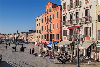 Street cafe on the waterfront Riva degli Schiavoni, Venice