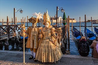 Carnival Masks on the Waterfront with San Giorgio Island, Venice