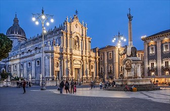 Cathedral square with cathedral and elephant fountain in the old town at dusk, Catania