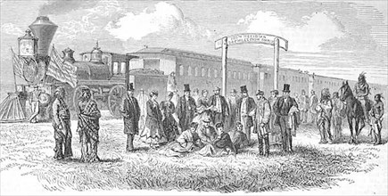 The railway in America, here a station in the prairie